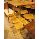 Four matching gold single pedestal tubular steel pub tables with square wooden tops 60 x 73 cm H