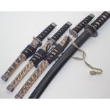 Four miniature Japanese swords / knives