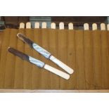 Roll of twelve Walker & Hall bone handled knives