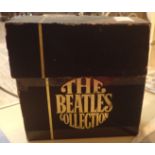 The Beatles Collection on parlaphone records box tatty twenty four singles