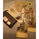 Leather wallet containing vintage postcards and bereavement cards