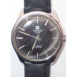 Tissot automatic black face gents wristwatch CONDITION REPORT: Working at lotting