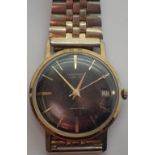 Ingersoll black faced gold plated wristwatch