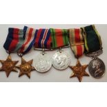 Set of war medals with ribbons including Efficient Service medal PR J H Buckly Cheshire Rgt.