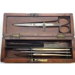WWI miniature doctors kit with scalpels and scissors in a mahogany box