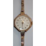 Ladies 9ct gold wristwatch and bracelet by Garrard in working order with papers 1963