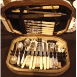 Wood cased canteen of stainless cutlery including carvers