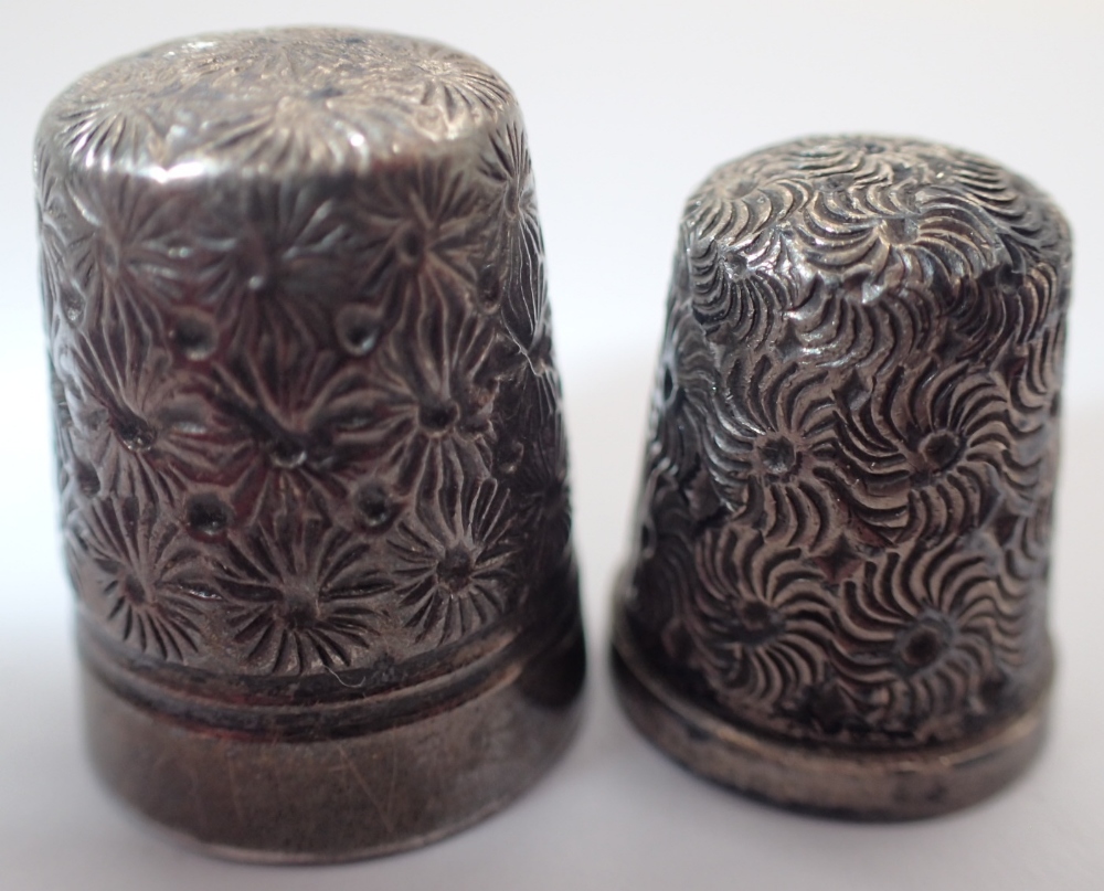 Two presumed silver thimbles one marked CH Dorcas other hallmarked