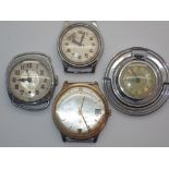 Four mechanical wristwatch heads