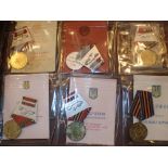 Six Russian medals complete with certificates