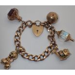 9ct gold bracelet with charms 49.