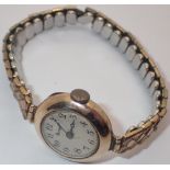 9ct yellow gold ladies Buren cocktail watch on a rolled gold expanding strap