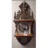 Dutch chiming wall clock with Delft back panel