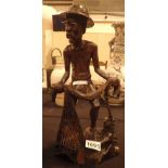 Hand carved Indonesian figurine of a fisherman A/F H: 35 cm