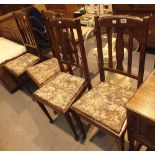 Four splat back oak dining chairs with drop in seats