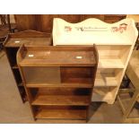 Three mixed bookcases