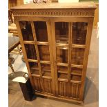 Oak glazed bookcase with linenfold decoration 77 x 35 x 138 cm H