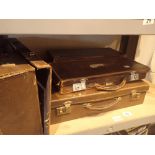 Four small leather Masonic cases and a wooden case