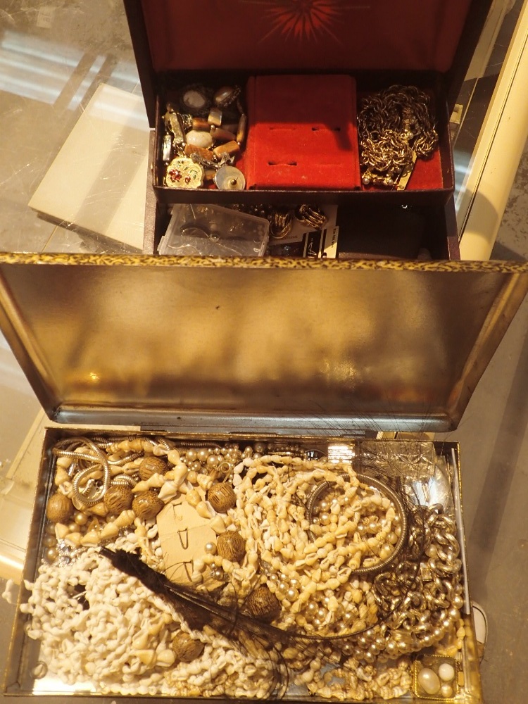 Two boxes of mixed unsorted costume jewellery