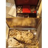 Two boxes of mixed unsorted costume jewellery