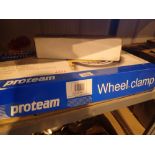 Proteam TN12 7HF wheel clamp and a car starter battery pack