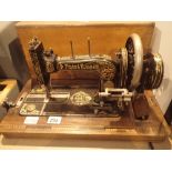 Vintage Frister & Rossmann hand operated sewing machine in carry case