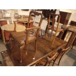 Walnut extending dining table with two l