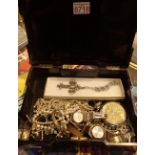 Decorative Oriental laquered box with costume jewellery wristwatches compact etc