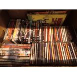 Box of DVDs and CDs