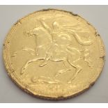 1974 Isle of Man half sovereign ( with coin mount damage ) 4.