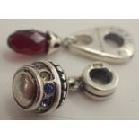 Two Chamilia hanging stone set charms