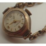 9ct gold ladies wristwatch on a 9ct gold bracelet 11.