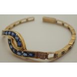 14ct gold diamond and sapphire bracelet 11.