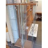 Two IKEA glass cabinets with interior lights