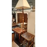 Mixed furniture tables and a standard lamp