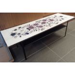 Retro style formica top coffee table in flower pattern