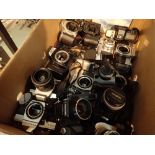 Box of mixed cameras and lenses including Nikon and Canon