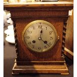 Oak cased chiming mantel clock