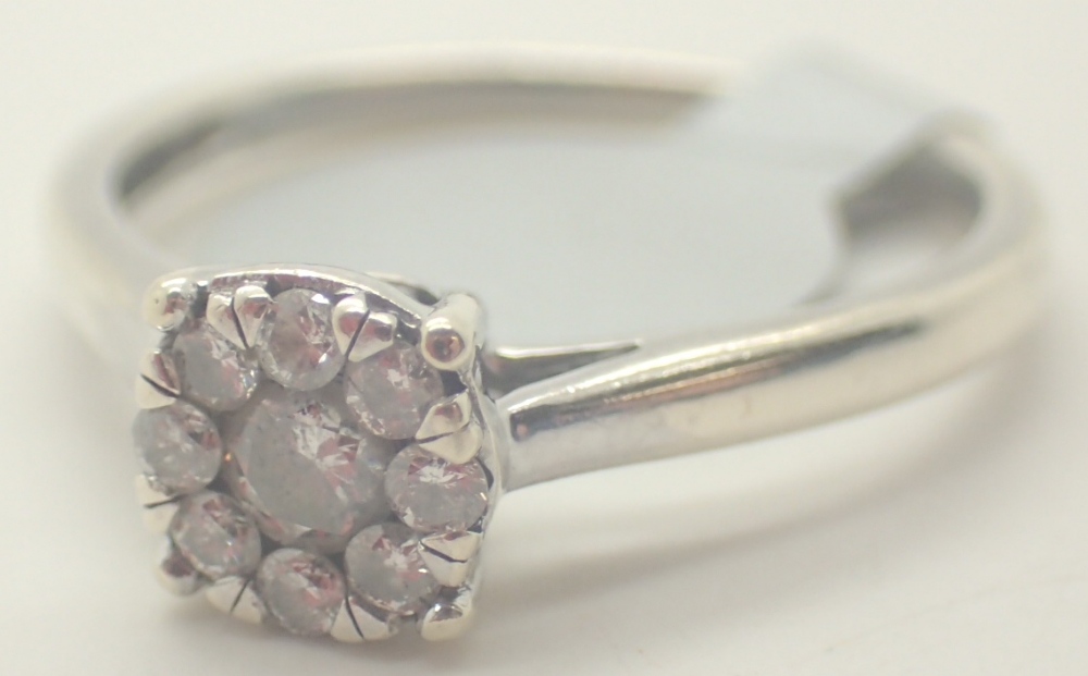 9ct white gold diamond halo ring RRP £900.