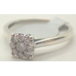 9ct white gold diamond halo ring RRP £900.