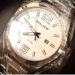 Boxed Police white face wristwatch on a steel bracelet CONDITION REPORT: This item