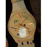 Large Swatch timepiece wall clock (lacking rods which attach watch to strap)