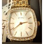 Boxed new old stock ladies gold tone Rotary wristwatch diamante bezel on matching strap with none
