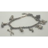 Silver charm bracelet with ten charms and padlock clasp