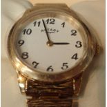 Boxed new old stock ladies gold tone white face Rotary wristwatch with matching strap