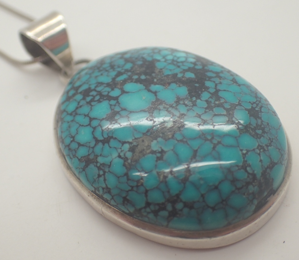 925 silver necklace with large blue and black stone pendant