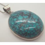 925 silver necklace with large blue and black stone pendant