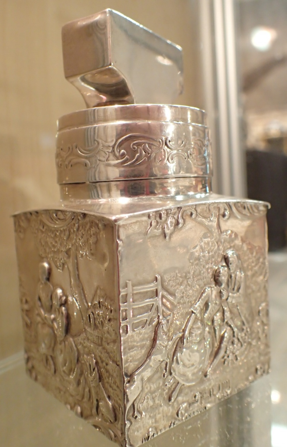 Edwardian 1907 sterling silver encased perfume bottle with embossed picnic scene complete with