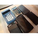 Seven assorted vintage calculators including Bohn Commodore Sharp and Texas Instruments