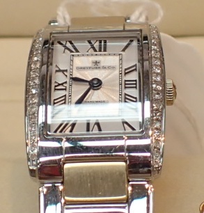 New old stock boxed ladies Dreyfuss and Co stainless steel wristwatch with diamand set bezel and